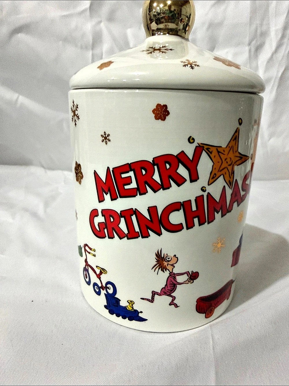The Grinch Merry Grinchmas canister Holiday Canister White & Red